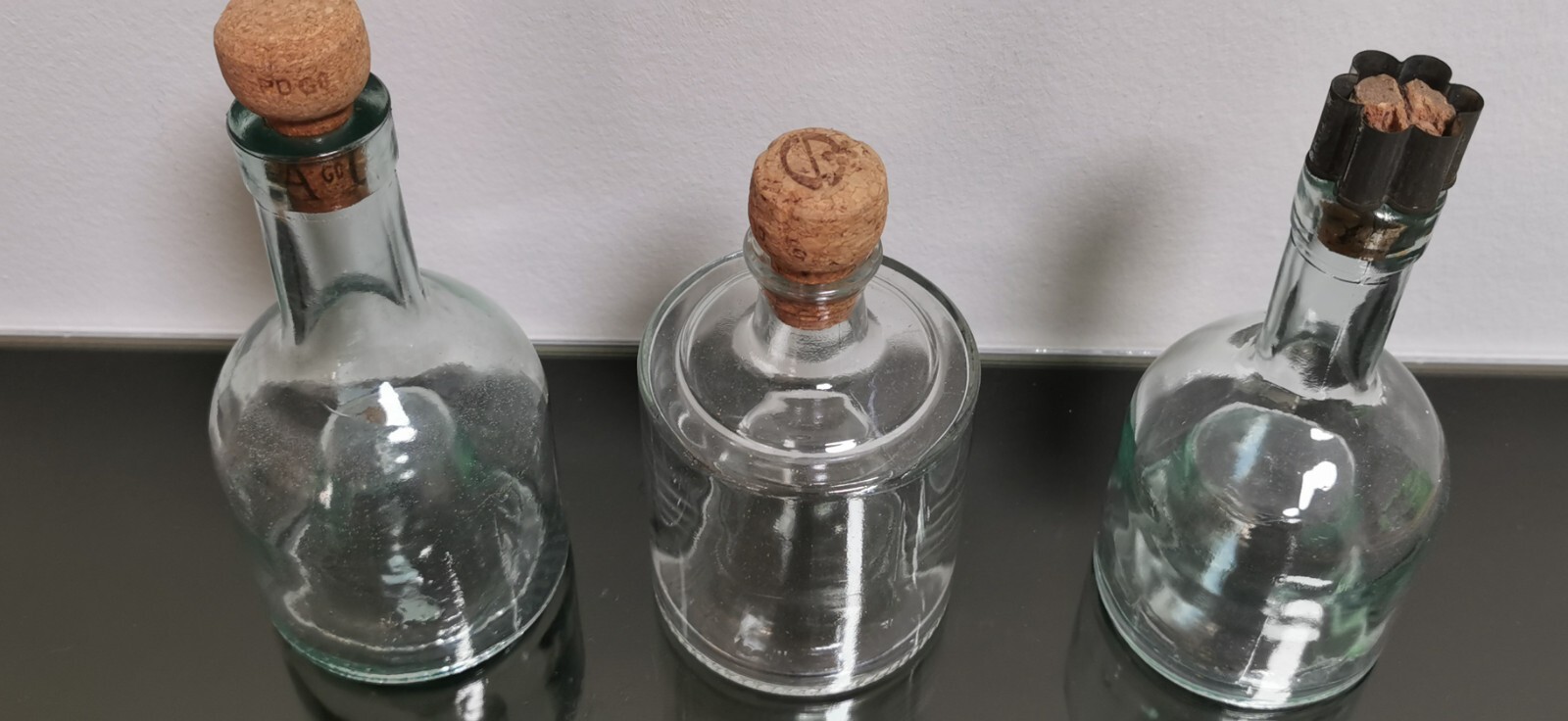 Set of 3 Collectible Bottles with Hand Blown Kick-up Base - Image 3