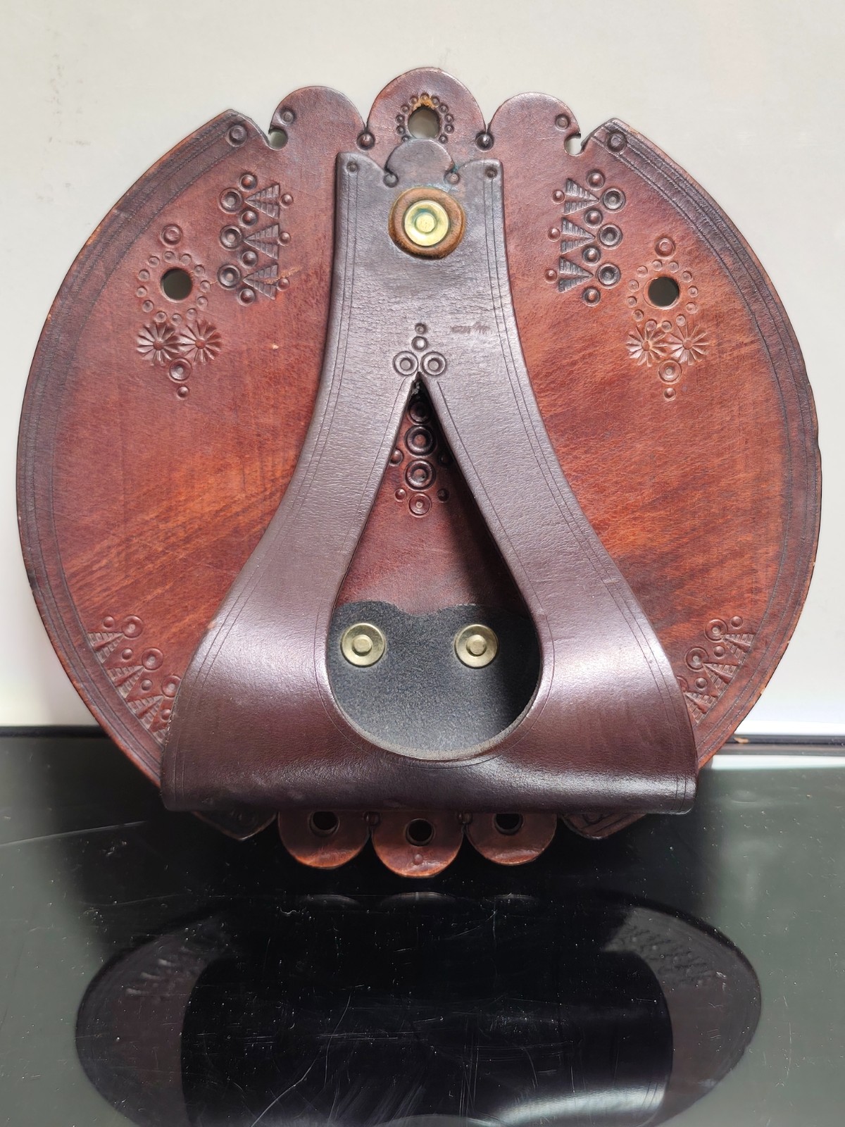 Wall-Mounted Leather Holder Perhaps for Tools or an Umbrella